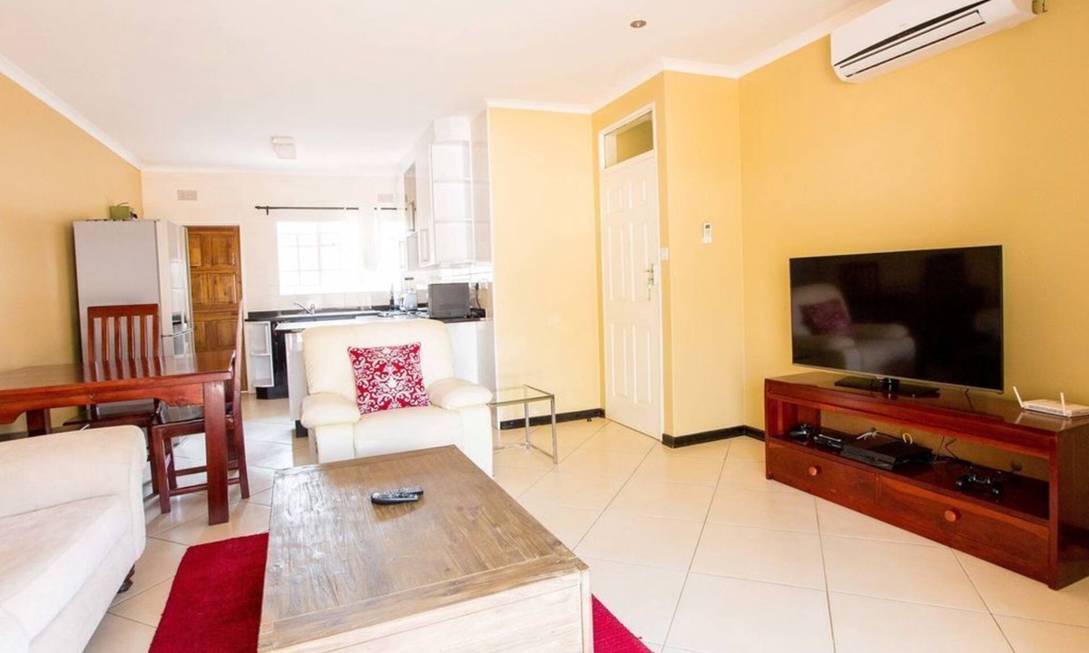 Harare House | 2 Bed roomed fully furnished and secure apartment,very close to shopping center.