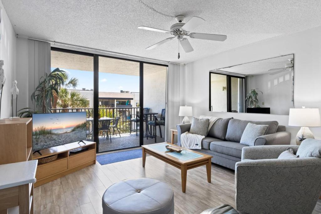 Port Canaveral Apartment | Cape Winds - Oceanfront Pool, Tennis & Sauna Condos near Port Canaveral