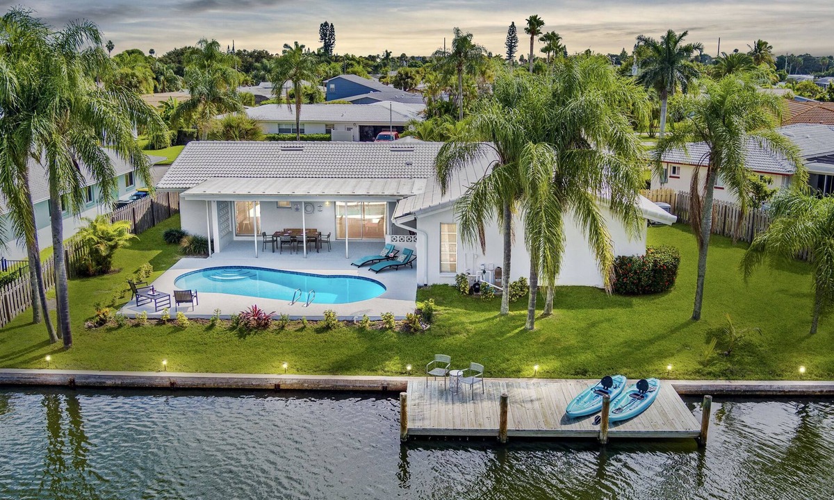 Venetian Way House | Cocoa Beach Coral Retreat waterfront 3 BR/2.5 BA