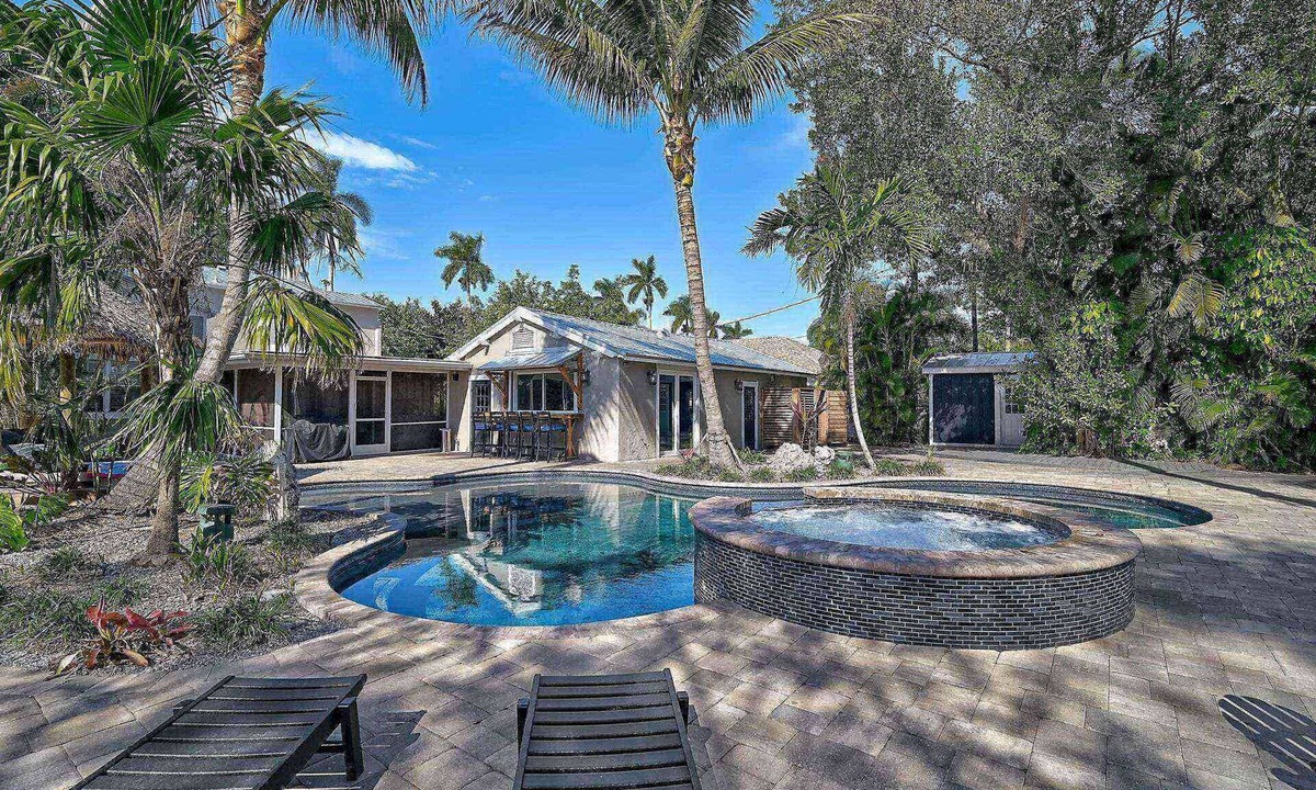 River District House | Escape to Villa Manteago: Resort-Style Estate with Pool, Spa, and Game Room, Minutes from Bradenton!