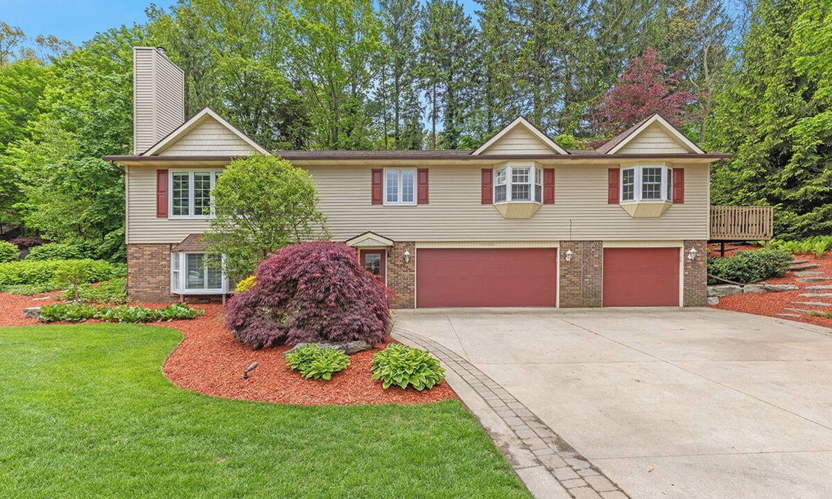 Holland House | Ideal Lakeshore location in serene wooded landscape with waterfalls.