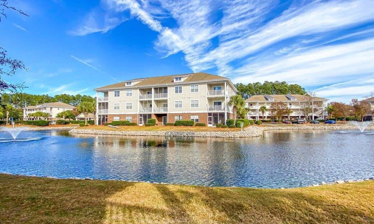 North Myrtle Beach Condo | Lakefront at Barefoot Resort w Massive Waterfront Pool Close to Beach