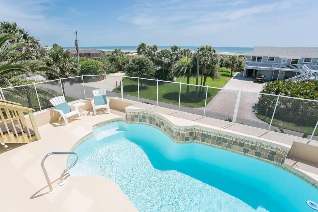 Butler Beach House | The Sand Castle Heated Pool Atlantic Ocean