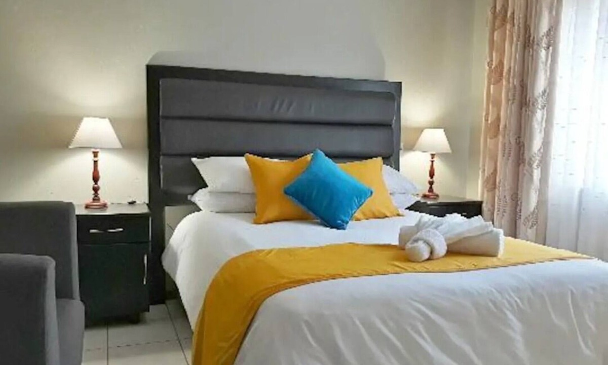 Harare Apartment | Upscale and Urban Warm Tasteful 1 Bed Apartment.
