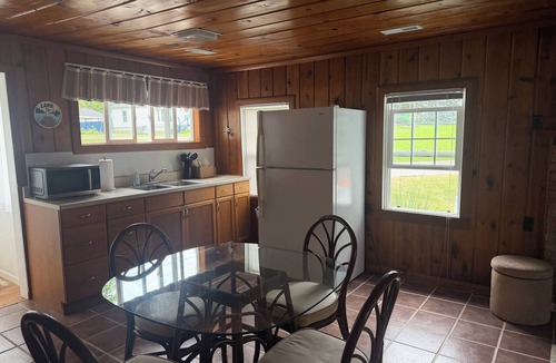 White Cloud House | 3-bedroom lakefront home on All-sports lake with private beach and dock.