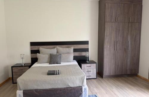 Mazowe Apartment | A spacious modern 3-bedroom ground-floor villa in Mount Pleasant Heights - 2366