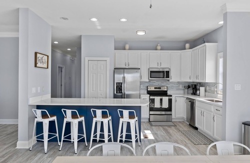 Cherry Grove Beach House | Amazing Channel Retreat Private Pool Luxury Outdoor Living & Pet Friendly