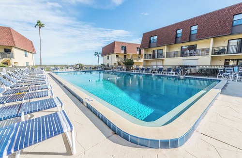 Avon By The Sea Condo | 🌴Beachfront Family Retreat: Pool, Private Balcony & Walk to the Pier