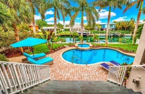 Anna Maria House | Bikini's & Martini's Waterfront Canal: 1 Block to Beach! Dock! On Canal! Anna Maria Life