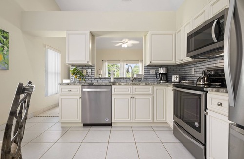 Sabal Harbour House | ⚓Blue Heron House! Cozy home w/heated pool and pool toys! Water view out back!⚓🌅
