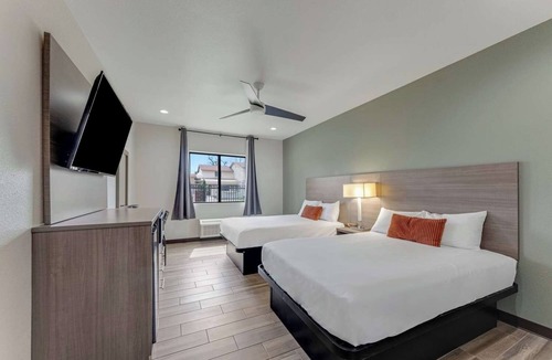 Eastside Promise Neighborhood Hotel | Book Your Stay: 3 Cozy Rooms w/Complimentary Breakfast & Parking in DT