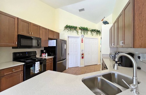 Westridge House | Bright vacation home with private pool and new kitchen in gated community 20 mins to Disney