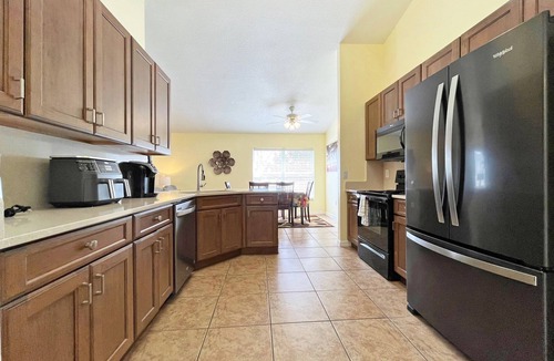 Westridge House | Bright vacation home with private pool and new kitchen in gated community 20 mins to Disney