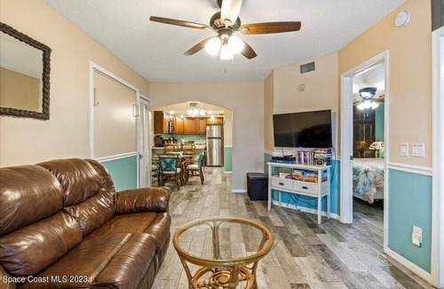 Chandler Park Condo | Cape Canaveral Oceanside Oasis - 1st floor with bikes and beach toys