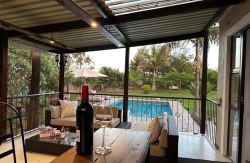 Harare House | Charming 2-bedroom house in peaceful Harare with a Pool ,AC, WiFi & fitness room