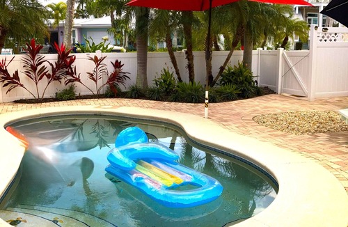Holmes Beach House | Charming one floor, 2-bedroom house steps to the beach, private heated pool