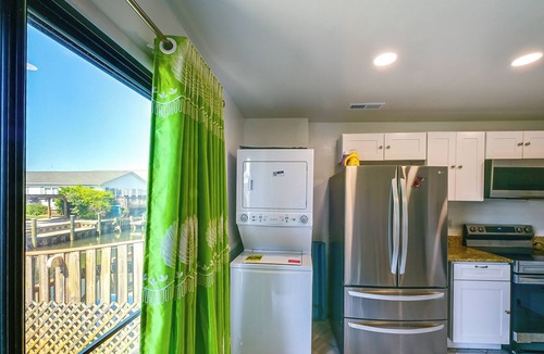 Caine Woods Apartment | Deck w/Canal Access: Ocean City Townhome