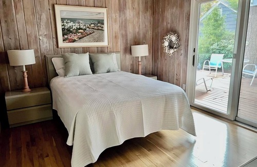 The Pines House | Dog-Friendly Beach Getaway with Koi Pond, Patio & Walkable to Town!