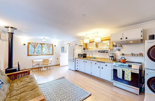 Cleone House | Dog-friendly, eco-conscious home with great yard & EV charger, near the beach