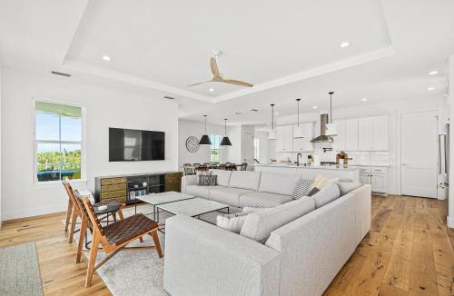 St. Augustine Beach House | Endless Summer Oasis- Luxury 5br, heated pool, elevator, steps to ocean!