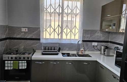 Lusaka Villa | Family & business friendly solar powered luxury 2 bed home with private pool