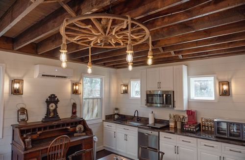 Cleveland Park House | Fully renovated 1800s Carriage House seamlessly blends history w/modern luxury.