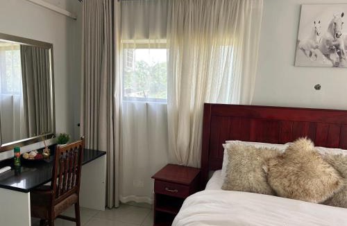 Kwekwe Apartment | Gaison Home garden view - 2323