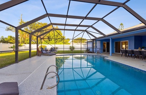 Cocoa Beach House | Gorgeous Coastal Getaway W/Heated Pool, Firepit & Outdoor Patio!🌴