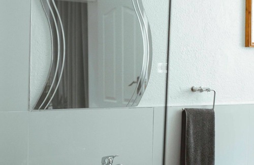 Harare Apartment | Harare Deluxe Homes- Grey-Suite Self contained studio with workspace and wifi