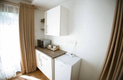 Harare Apartment | Harare Deluxe Studio-Beige Suite