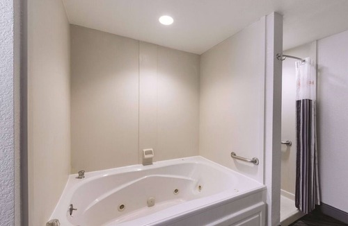 Arsenal Hotel | Jetted Tub Deluxe King Suite, Pet-Friendly, Near San Antonio Missions Park