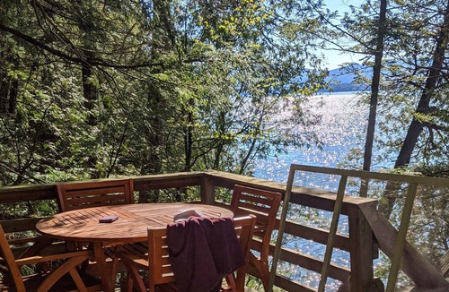 Vergennes Cabin | Lakefront cottage with private beach. Canoe, Firepit, Pet Friendly. Family owned