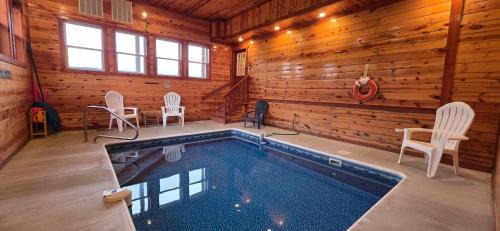 Chalet Village North House | Luxe Sister Cabins Sleeps 24 Pool Hot Tub Games