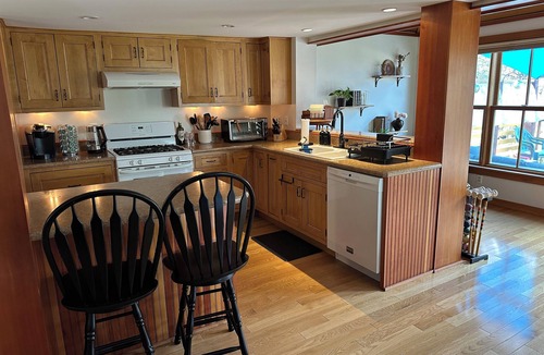 Moretown House | Mad River Valley riverfront retreat with sauna, swimming access, pooltable