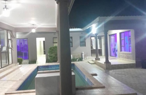 Kadoma Apartment | Modernly Furnished Standard Room With Queen bed - 2220