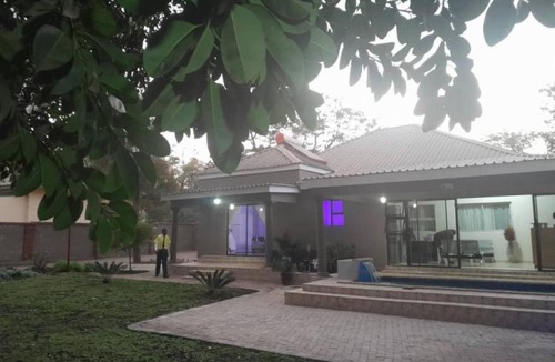 Kadoma Apartment | Modernly Furnished Standard Room With Queen bed - 2220