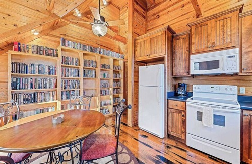Tuckasegee House | Mountain cabin with wrap-around balcony, games, fireplace, & children's items