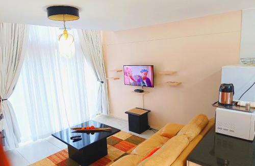 Harare House | New 1 Bed Apartment 3mins walk to New 1 bed shops Only has 1 extra king bed