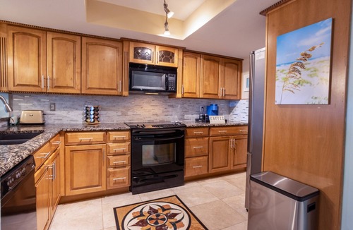 Chandler Park Condo | Ocean Serenity: Oceanfront Haven with Pool Access, Sauna Sessions, and Private Screened-in Patio!