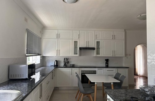 Harare East Apartment | Peaceful 4-Bedroom Retreat with Lush Gardens & Pool – Highlands - 2346