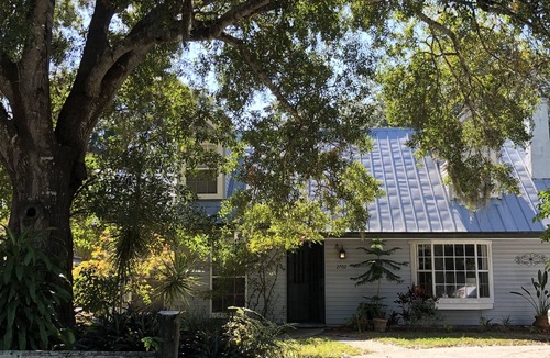 Arlington Park House | Pet-friendly, lovely home with large inground pool, live oaks and fenced yard.