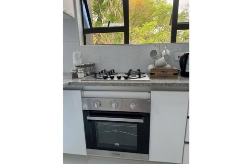 Harare Apartment | Pool-view Executive Suite