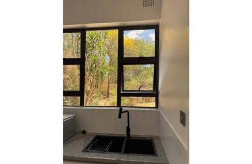 Harare Apartment | Pool-view Executive Suite