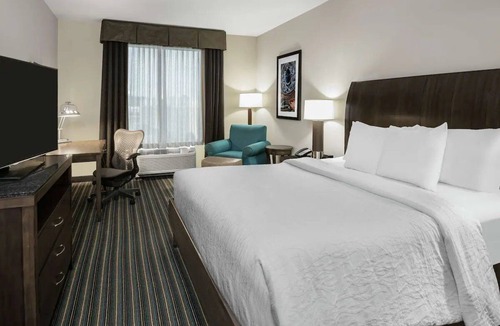 Far North Central Hotel | Refined Room Designed for a Relaxing Escape w/Great Dining Options