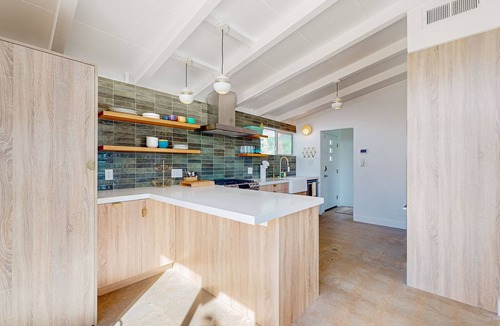 Magnesia Falls Cove House | Remodeled midcentury charmer with private salt water pool spa and mountain views