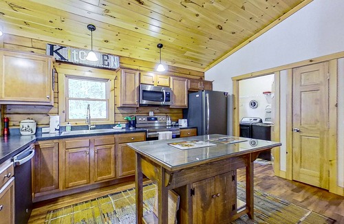 Warrensburg House | Riverfront dog-friendly house near skiing with firepits, wood stove & beach