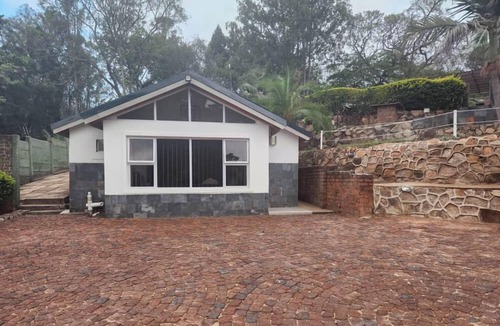 Harare Cabin | Room 1 of 8 Cozy Suites at The Hilltop Guesthouse