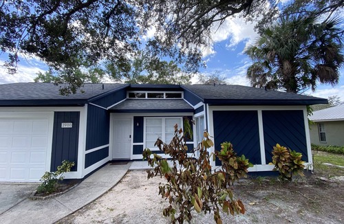 Ridge Wood Heights House | Serene Blue House by Siesta Key