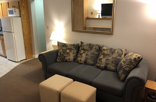 Carrabassett Valley Apartment | Ski In/Out at Sugarloaf Short Walk or Shuttle to Bars and Base Area Sleeps 4
