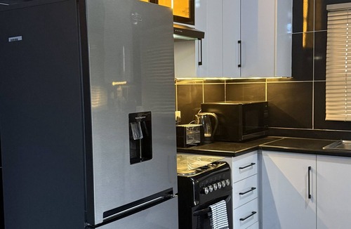 Harare East House | Spacious, bright, inviting 2‑bed home in a secure, affluent neighbourhood.